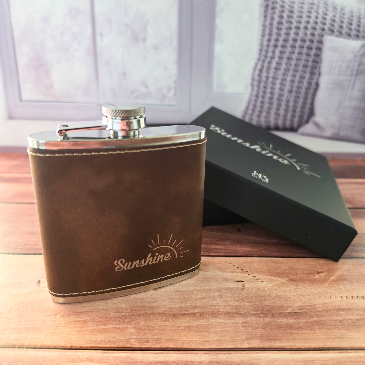 Custom engraved leatherette flask showing contrasting laser engraving