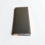 Black leatherette tally book cover with silver engraving