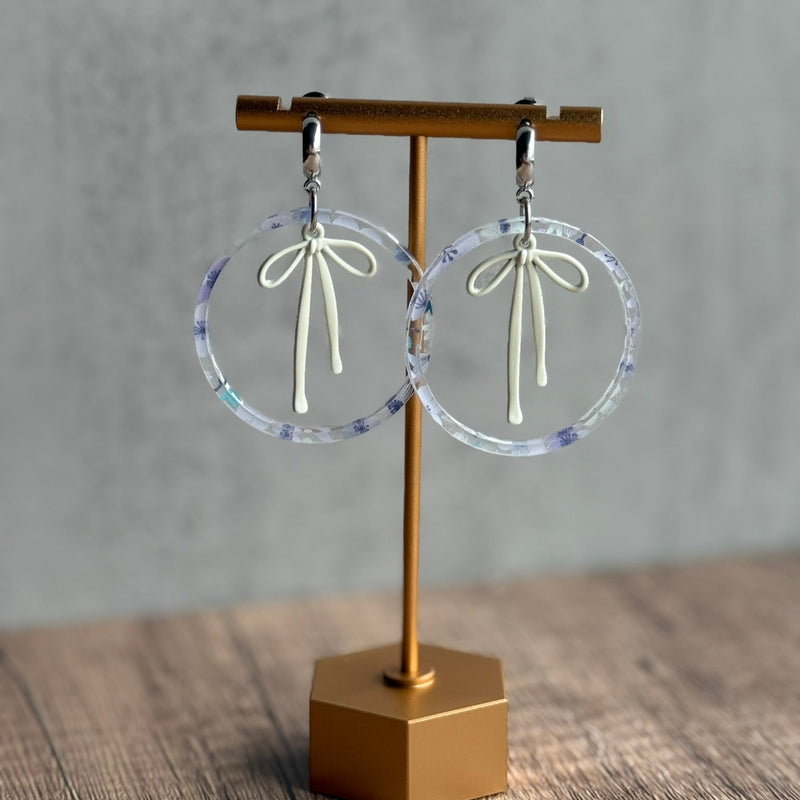 Acrylic Hoop Earrings with Draped Bow Charm