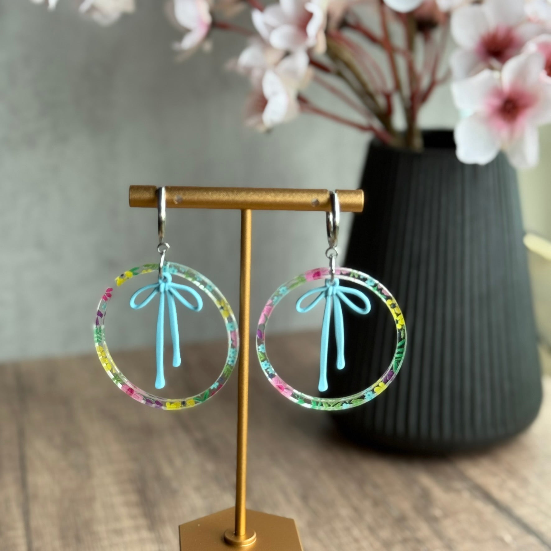 Acrylic Hoop Earrings with Draped Bow Charm