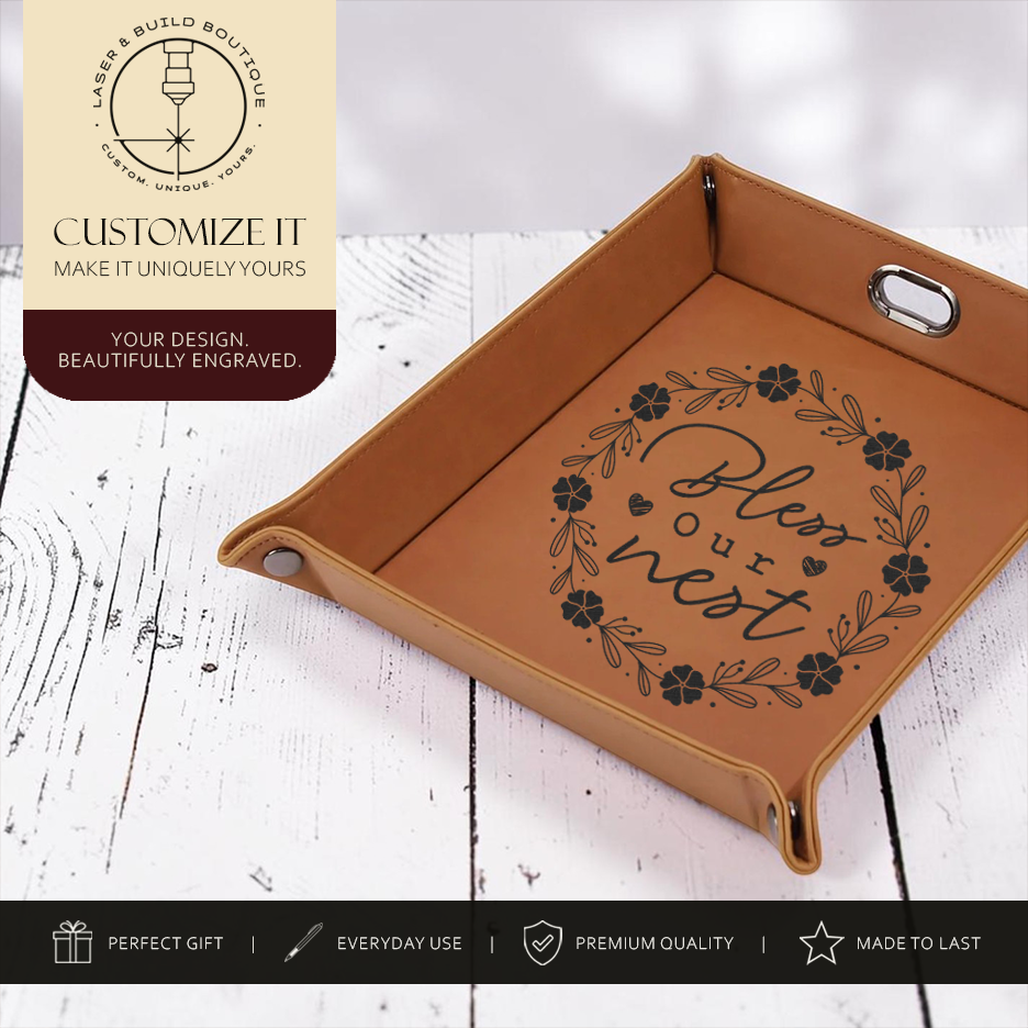 Personalized Laserette valet tray engraved with a family name holding keys, wallet, watch, and phone