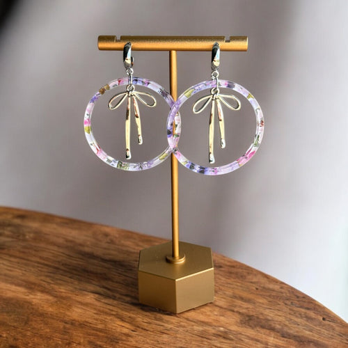 Acrylic Hoop Earrings with Draped Bow Charm