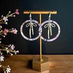 Custom engraved Floral Acrylic Hoop Earrings with Draped Bow Charm Acrylic Earrings by Laser & Build Boutique