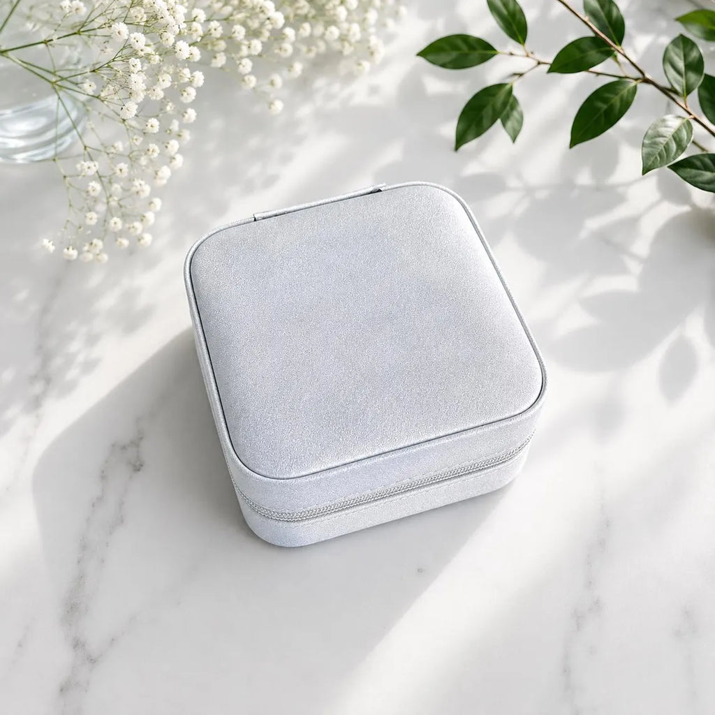 Compact personalized jewelry case with soft suede interior for travel in light grey