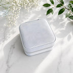 Compact personalized jewelry case with soft suede interior for travel in light grey