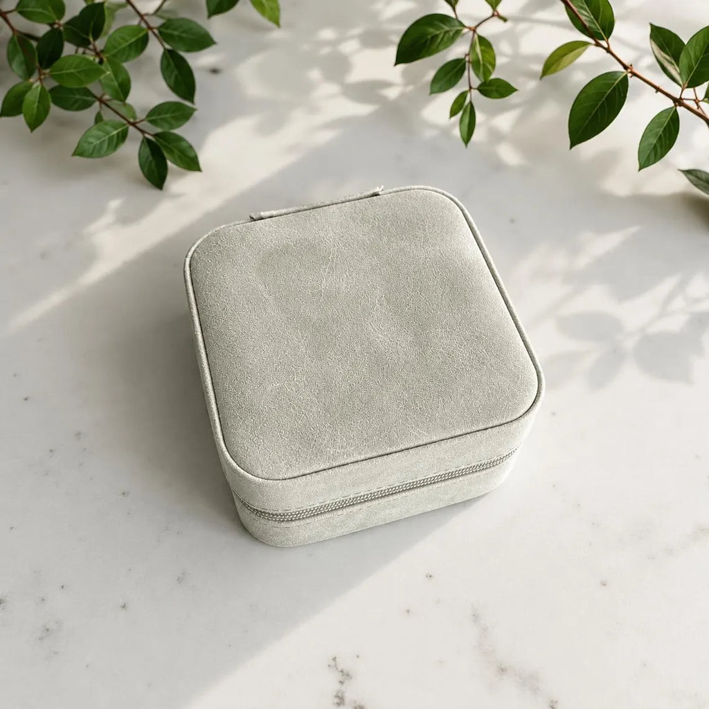 Compact personalized jewelry case with soft suede interior for travel in light green