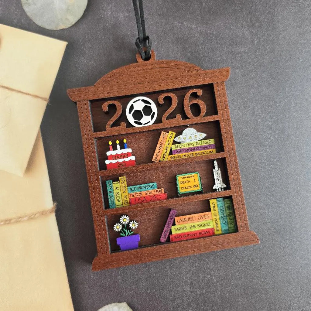 2026 time capsule bookshelf ornament with colorful miniature books and hand painted wood details