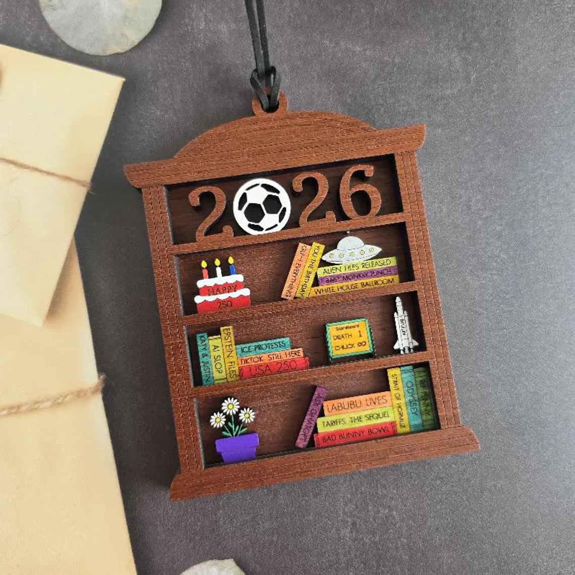 2026 time capsule bookshelf ornament with colorful miniature books and hand painted wood details