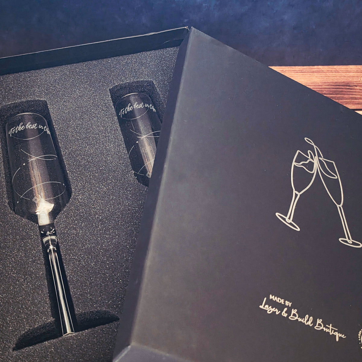 Matching 7.3 oz engraved champagne flutes for anniversary or wedding toasts