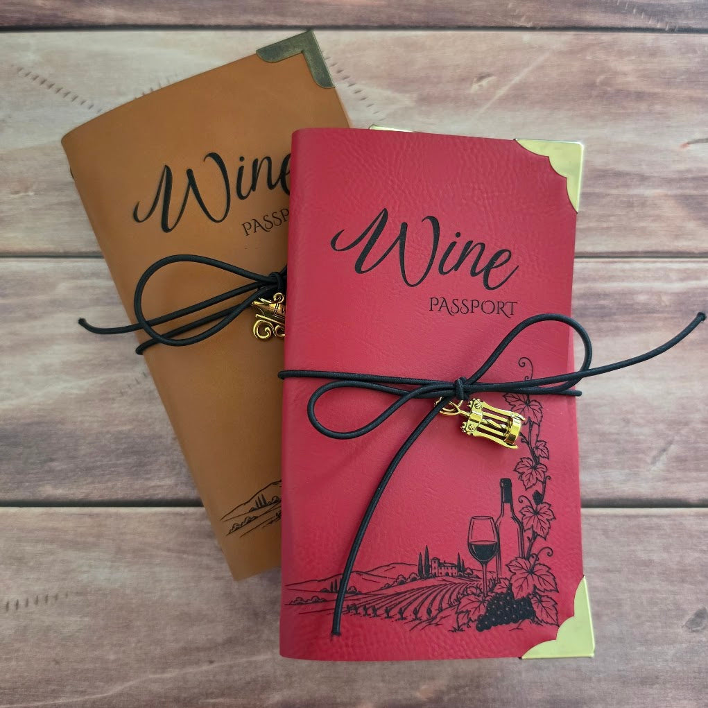 Red and Rawhide leatherette wine journals with engraved vineyard design